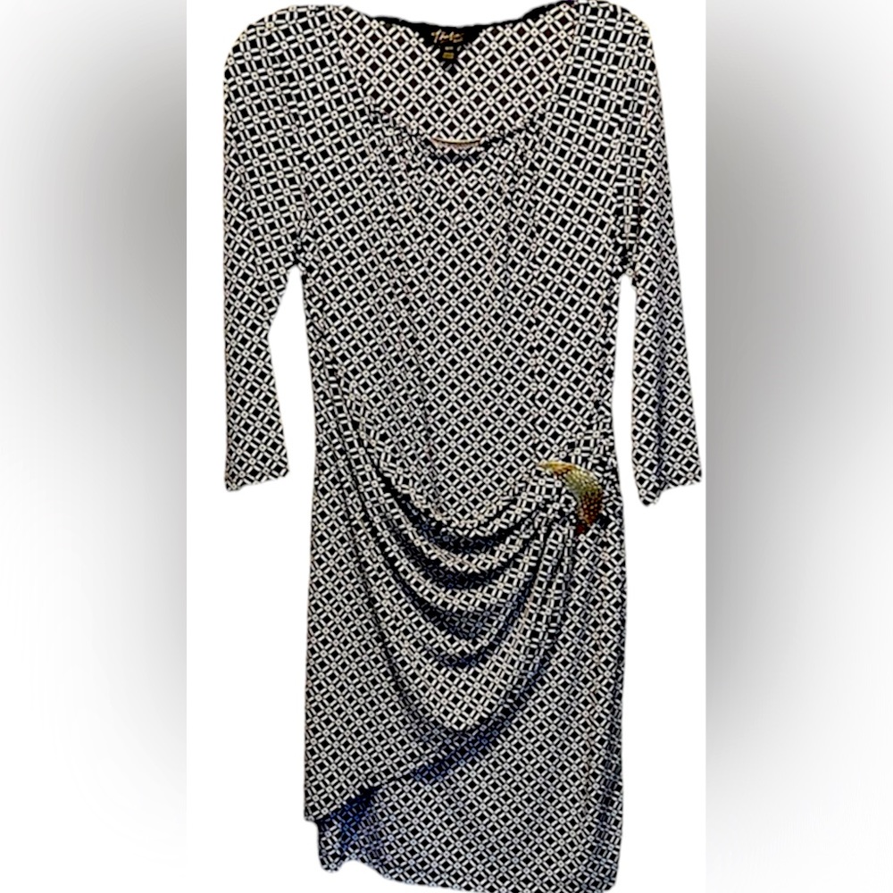 Cute and comfortable Thalia Sodi dress. Navy and White with gold embellishments.